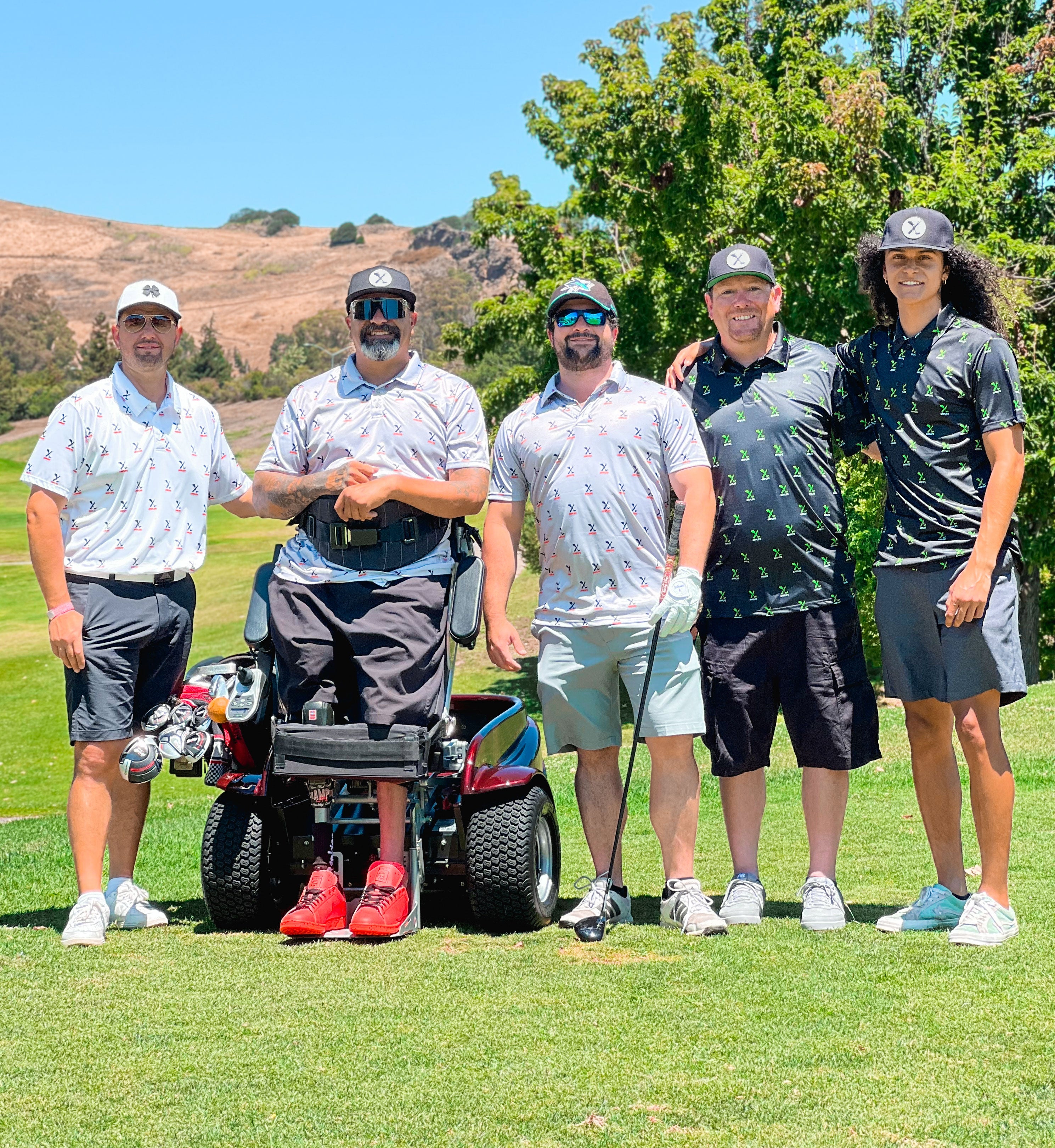 Amplife® Foundation & Amplife® Founder Abdul Nevarez with Amplife® Foundation Co-Founder Armando Nevarez and group of three other Amplife® Supporters on the golf course