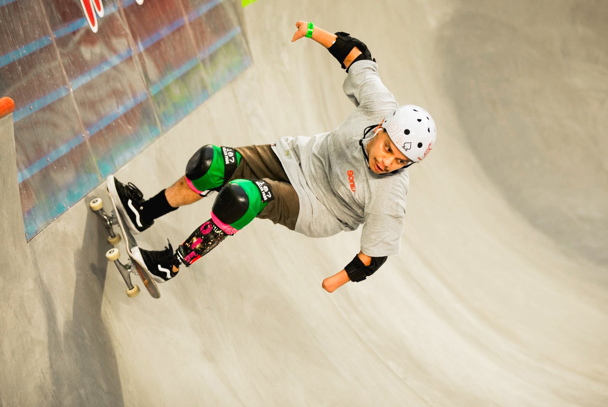 Team Amplife® Ambassador Oscar Loreto, Jr. riding down a bowl on his skateboard in a skate competition