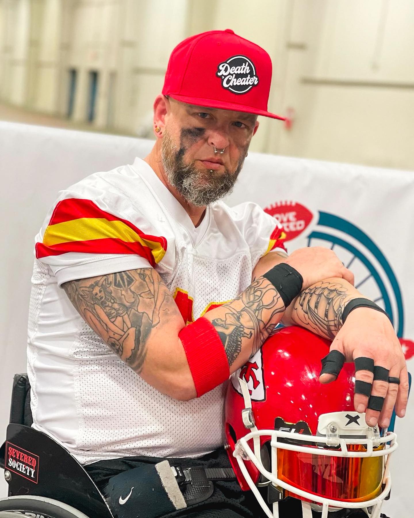 Team Amplife® Ambassador Jason Loftiss portrait while playing wheelchair football as the Kansas City Chiefs.