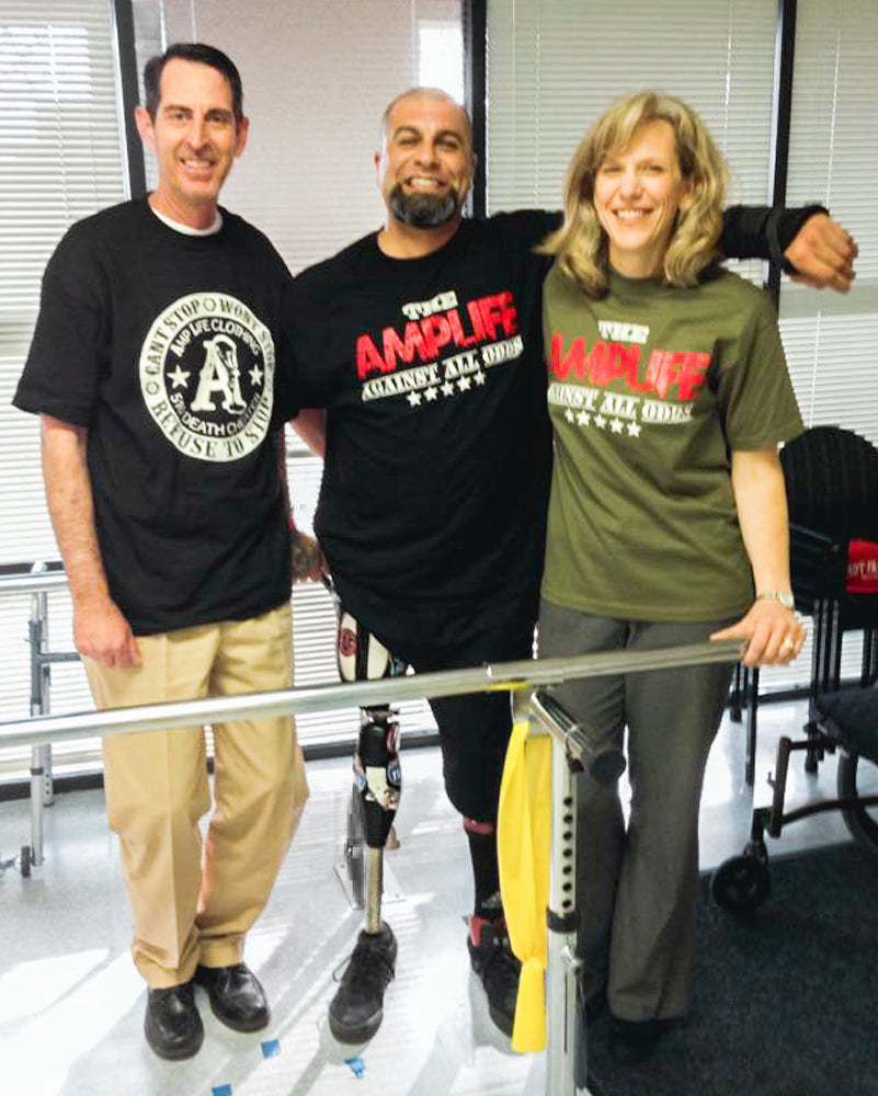 Group photo of Amplife® Foundation & Amplife® Founder Abdul Nevarez with his prosthetist Wade Skardoutos and assistant supporting Amplife®