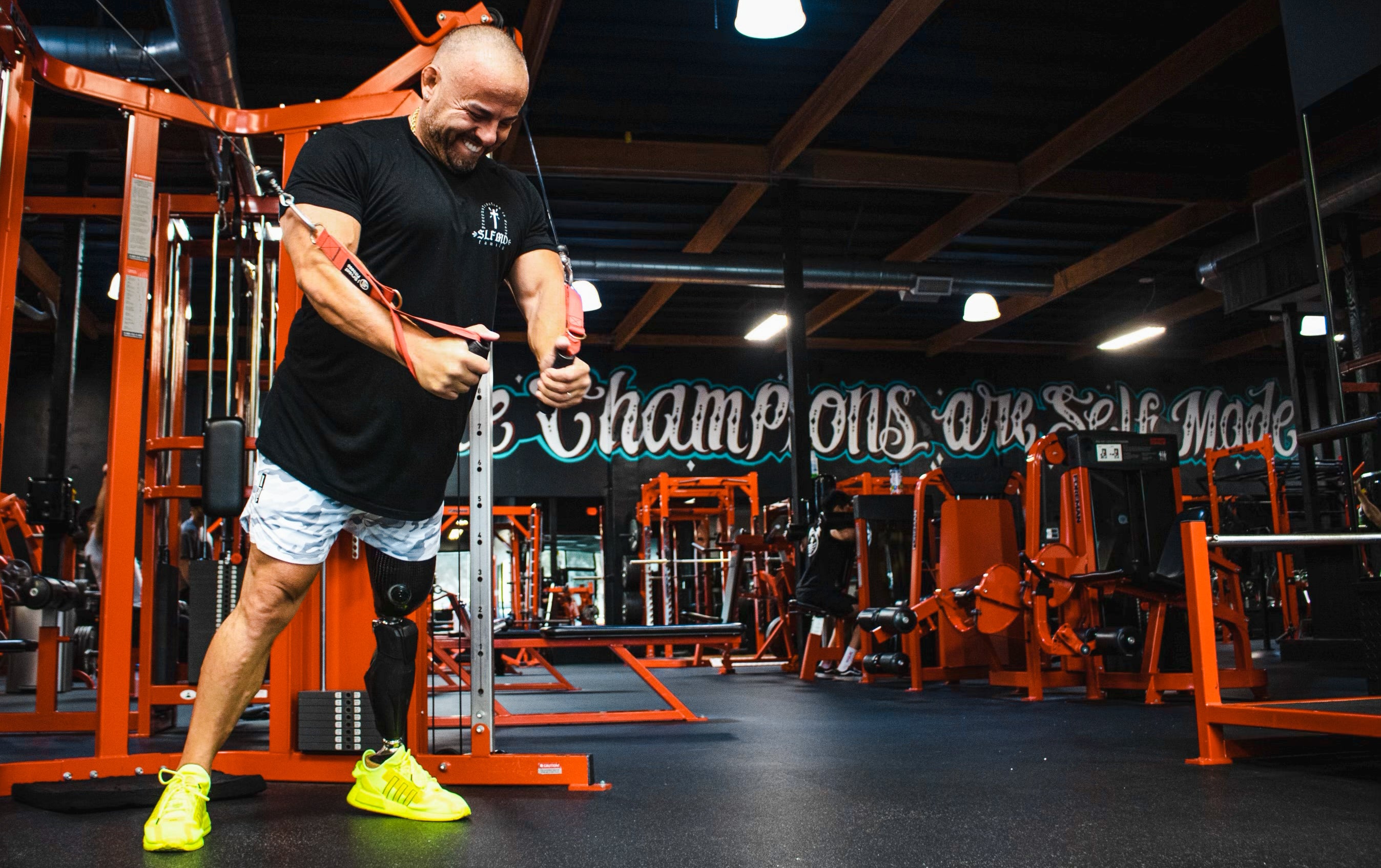 Team Amplife® Ambassador Tomás De La Mora performing a cable chest fly in his disabled-owned gym, Self Made Training Facility Costa Mesa